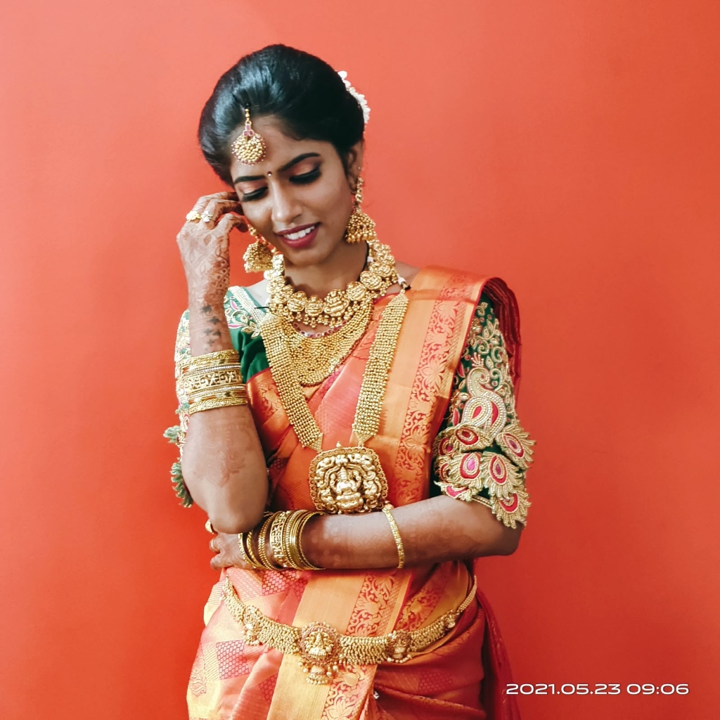 Traditional Temple Jewelry Orange Silk Saree Artistry