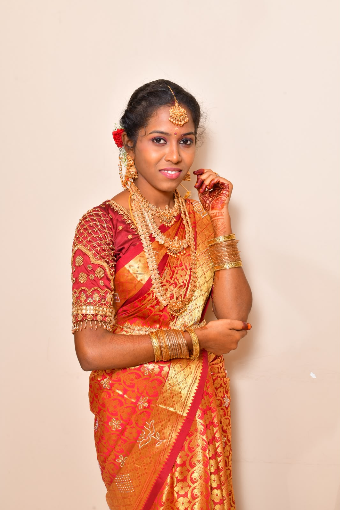 Traditional Red & Gold Silk Saree Bride with Layered Gold Chains